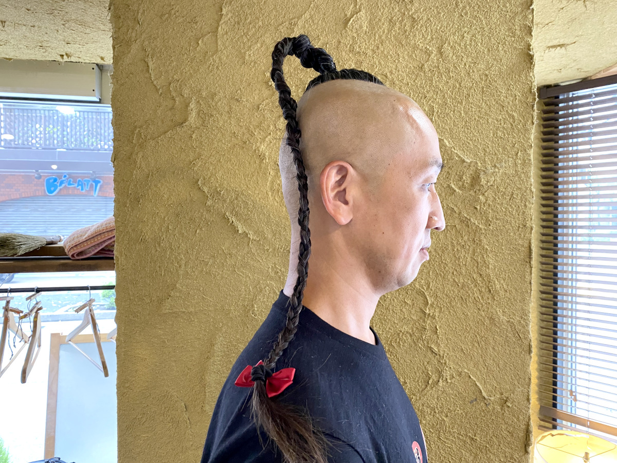 ラーメンマンの髪型なぜあの形？辮髪の真相と女子ヘア流行の全貌